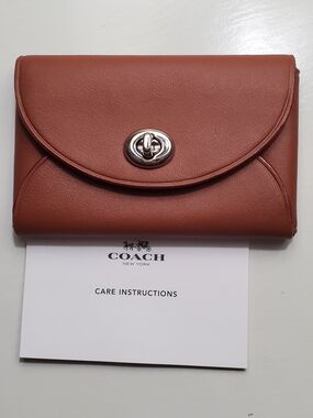 Coach Leather Turnlock Caed Case in Saddle Brown